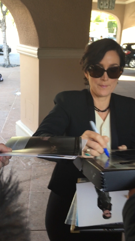 Carrie-Anne Moss Signing Autograph for RACC Autograph Collector Mike Schreiber