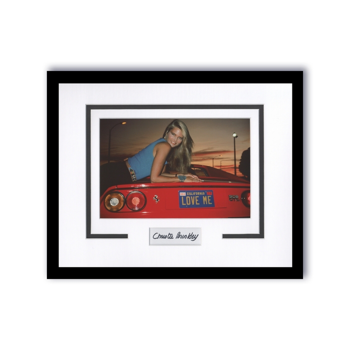 Item # 156802 - Christie Brinkley "Vacation" AUTOGRAPH Signed Photo Framed 11x14 Display