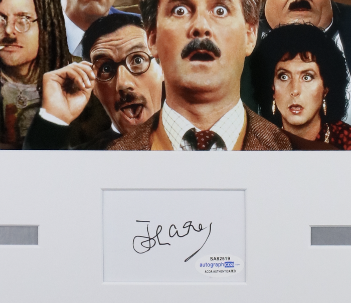 Item # 144667 - John Cleese "Monty Python's The Meaning of Life" SIGNED Framed 16x20 Display
